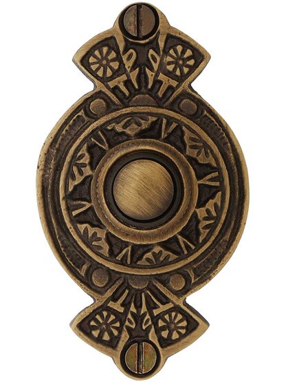 Oriental Pattern Doorbell Button in Antique Brass.